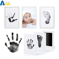 Baby Handprint and Footprint Kit with Ink Pad, Photo Frame, and Storage Drawer - Create Lasting Memories and Unique Souvenirs Without a Messy Ink Mess!