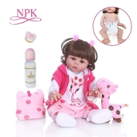 Realistic Bebe Doll with Curly Hair in Pink Dress - 49cm Toddler Girl Reborn Full Body Silicone Toy for Bath, Waterproof.