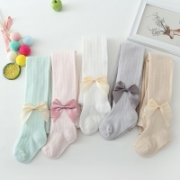Breathable Cotton Girls' Summer Pantyhose with Mosquito Protection and Bowtie Detail.